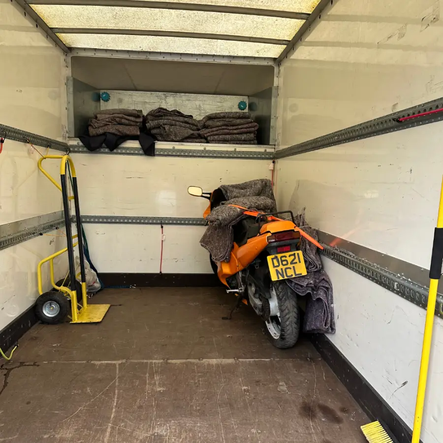 Motorbike strapped securely inside the Removals Leighton Buzzard van for transport