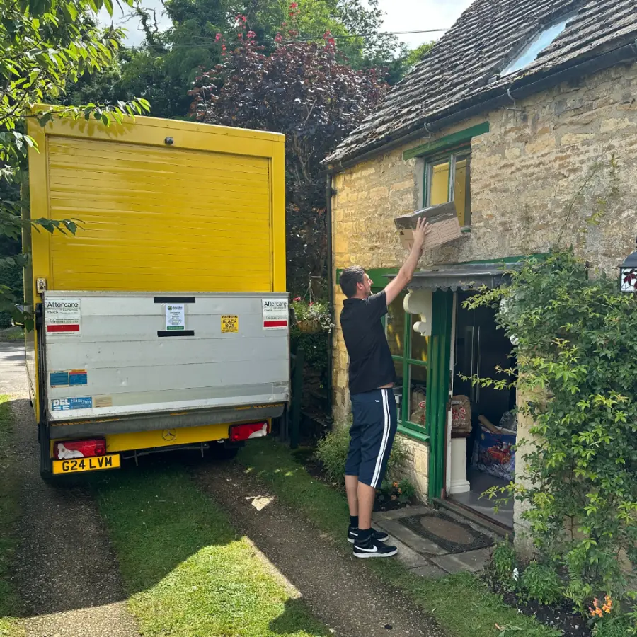 Removal at a period cottage with the van backed up to the front door