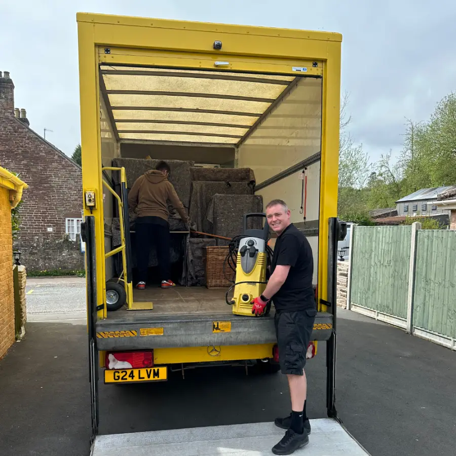 Grant loading a removal at a customer's house with the tail lift down